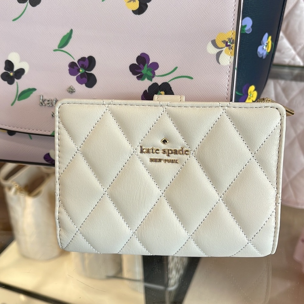 Kate Spade Carey Medium Compartment Bifold Wallet
COLOR: Parchment - Picture 8 of 16